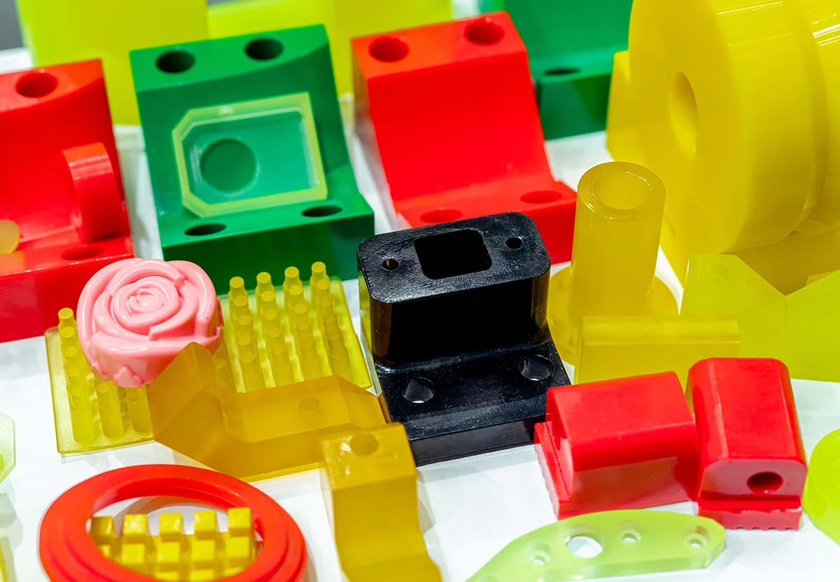 Mixed plastic parts that were manufactured by the injection molding process.