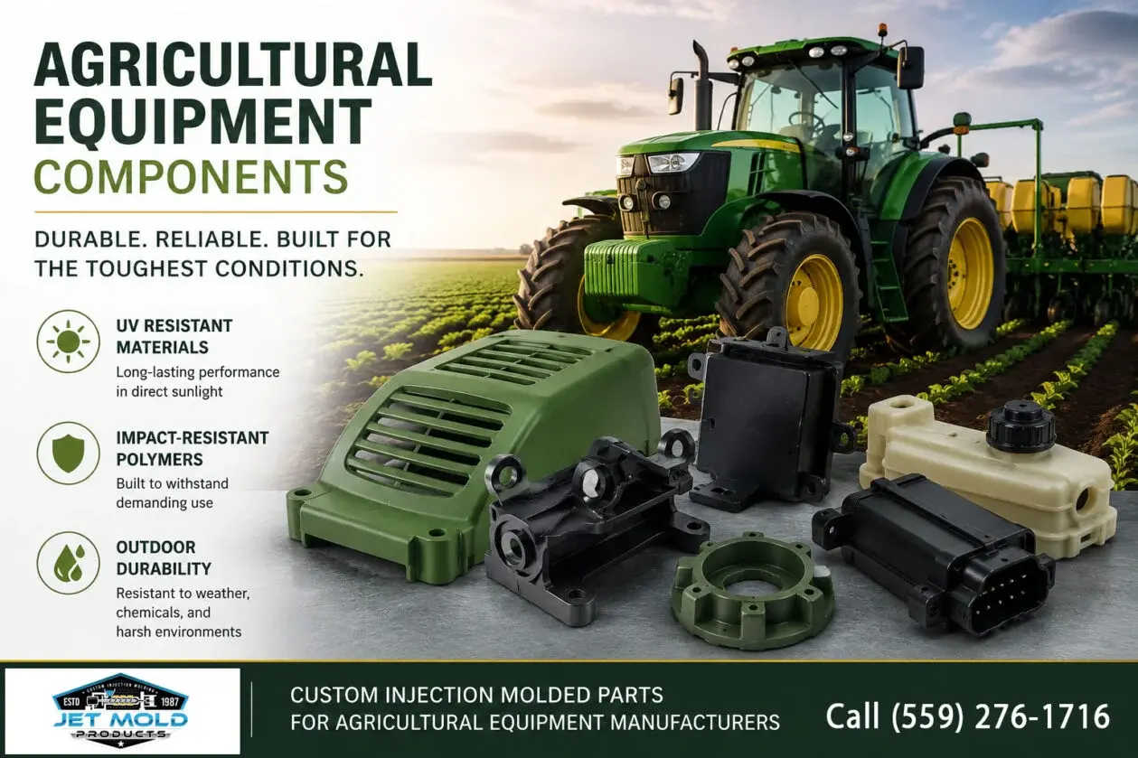 Various agricultural equipment parts displayed with a tractor